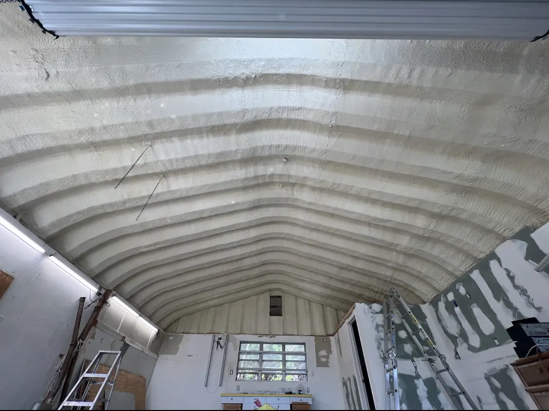 Spray polyurethane foam applied to the underside of a metal roof deck in Bensenville